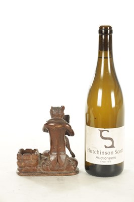 Lot 1158 - A LATE 19TH CENTURY CARVED BLACK FOREST DESK FOX TIDY