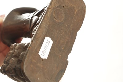 Lot 1158 - A LATE 19TH CENTURY CARVED BLACK FOREST DESK FOX TIDY