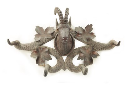 Lot 1216 - A LATE 19TH CENTURY BLACK FOREST COAT RACK