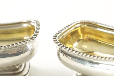 Lot 388 - A PAIR OF GEORGE III SILVER AND SILVER GILT SALTS