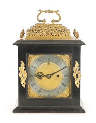 Lot 1070 - A WILLIAM AND MARY AND LATER EBONY VENEERED BASKET TOP BRACKET CLOCK OF SMALL PROPORTIONS