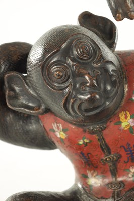 Lot 185 - A 19TH CENTURY CHINESE BRONZE AND CLOISONNE SCULPTURE OF A MONKEY