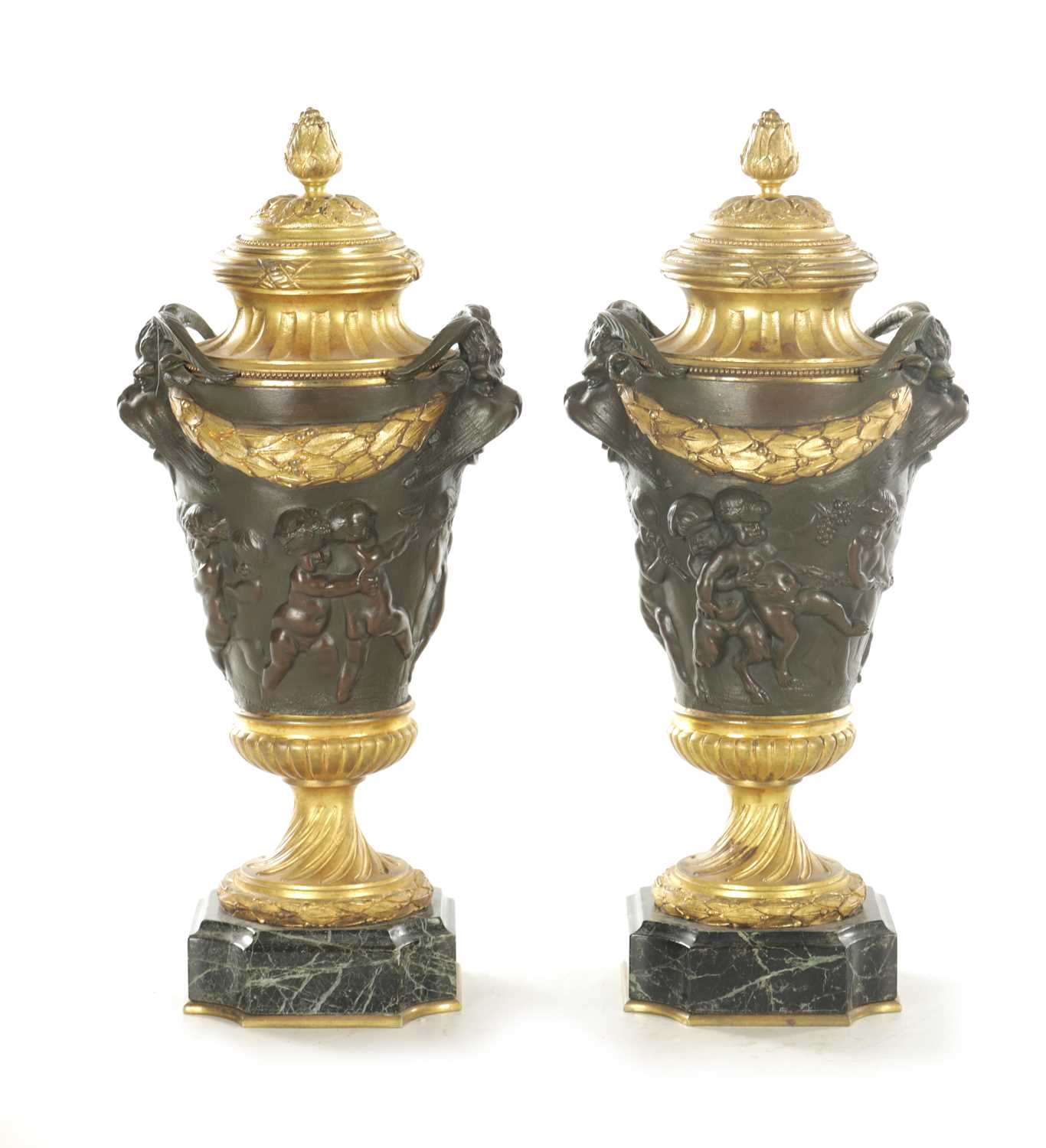 Lot 857 - FERDINAND BARBEDIENNE, A PAIR OF LATE 19TH CENTURY FRENCH BRONZE AND GILT BRONZE LIDDED URNS AFTER A DESIGN BY COLIDON