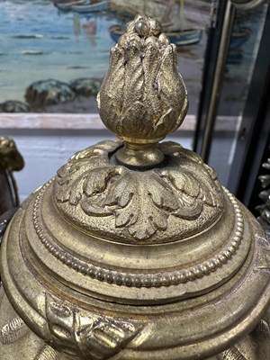 Lot 857 - FERDINAND BARBEDIENNE, A PAIR OF LATE 19TH CENTURY FRENCH BRONZE AND GILT BRONZE LIDDED URNS AFTER A DESIGN BY COLIDON