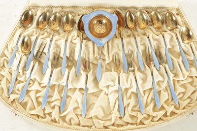 Lot 387 - A NORWEGIAN ART DECO SILVER-GILT AND GUILLOCHE ENAMEL COFFEE SPOON SET