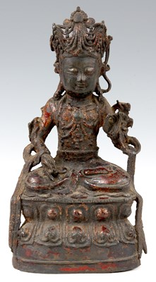 Lot 169 - AN EARLY ORIENTAL CAST BRONZE SEATED BUDDHA...