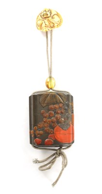 Lot 105 - A MEIJI PERIOD JAPANESE LACQUERED INRO WITH AMBER GLASS OJIME AND BONE NESUKE