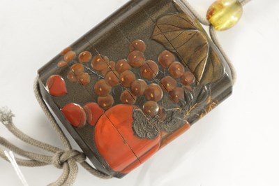 Lot 105 - A MEIJI PERIOD JAPANESE LACQUERED INRO WITH AMBER GLASS OJIME AND BONE NESUKE