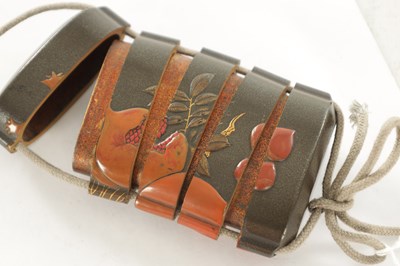 Lot 105 - A MEIJI PERIOD JAPANESE LACQUERED INRO WITH AMBER GLASS OJIME AND BONE NESUKE