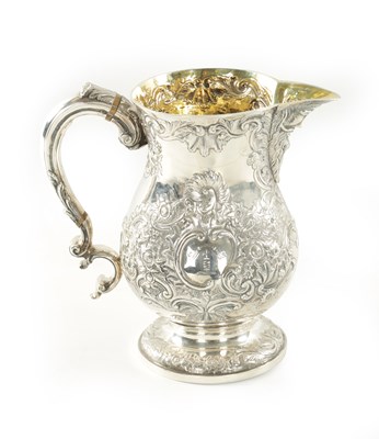 Lot 393 - A GEORGE III SILVER ALE JUG OF LARGE SIZE