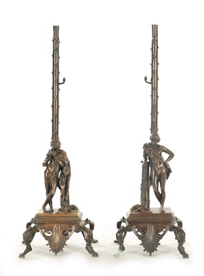 Lot 750 - A PAIR OF 19TH CENTURY REGENCY STYLE BRONZE CANDLESTICK/LAMP BASES