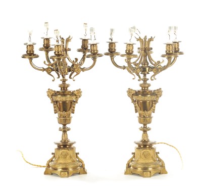 Lot 816 - A PAIR OF EARLY 20TH CENTURY GILT BRONZE FIVE BRANCH CANDELABRA