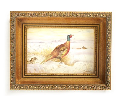 Lot 45 - A ROYAL WORCESTER HAND PAINTED CERAMIC PLAQUE DECORATED WITH PHEASANT IN THE SNOW SIGNED BRYAN COX