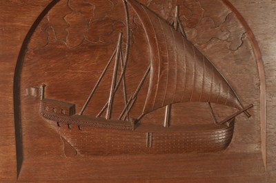 Lot 1166 - AN ARTS AND CRAFTS CARVED WALNUT HANGING PANEL