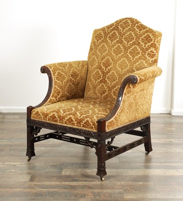 Lot 1359 - A 19TH CENTURY CHIPPENDALE STYLE UPHOLSTERED ARMCHAIR OF LARGE SIZE