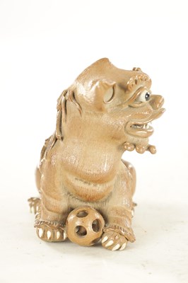 Lot 177 - A 19TH CENTURY CHINESE SALT GLAZE TERRACOTTA SEATED FOO DOG