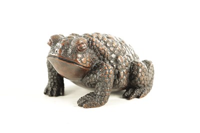 Lot 194 - A JAPANESE MEIJI PERIOD CARVED WOOD OKIMONO OF A TOAD