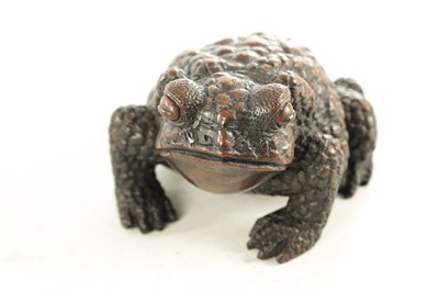 Lot 194 - A JAPANESE MEIJI PERIOD CARVED WOOD OKIMONO OF A TOAD