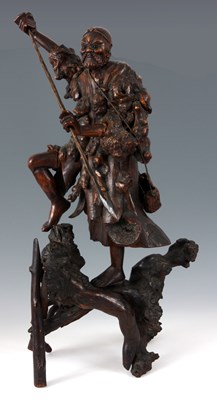 Lot 221 - A 19TH CENTURY CHINESE ROOT CARVED FIGURE OF A...