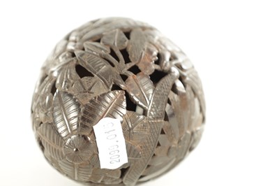 Lot 1148 - AN EARLY 19TH CENTURY EASTERN CARVED COCONUT BUGBEAR MONEYBOX