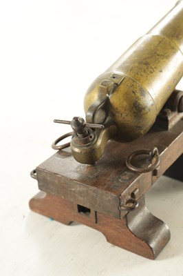 Lot 549 - A 19TH CENTURY BRASS AND IRONWORK MODEL OF A CARRONADE CANNON