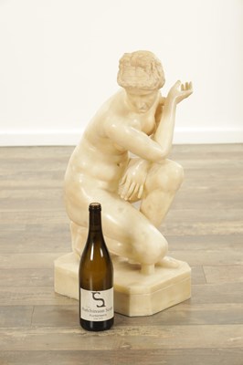 Lot 729 - A 19TH CENTURY NUDE ALABASTER SCULPTURE OF THE CROUCHING VENUS