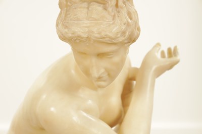 Lot 729 - A 19TH CENTURY NUDE ALABASTER SCULPTURE OF THE CROUCHING VENUS