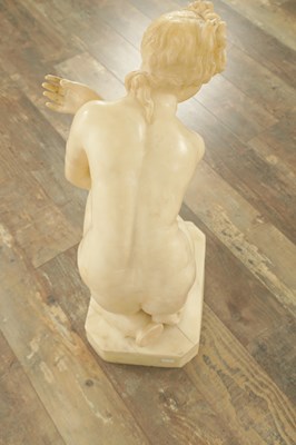 Lot 729 - A 19TH CENTURY NUDE ALABASTER SCULPTURE OF THE CROUCHING VENUS