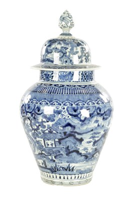 Lot 118 - A 17TH CENTURY JAPANESE ARITA BLUE AND WHITE VASE AND COVER