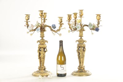 Lot 704 - A PAIR OF EARLY 19TH CENTURY FRENCH ORMOLU AND PORCELAIN MOUNTED CANDELABRA