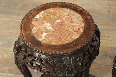 Lot 121 - A PAIR OF 19TH CENTURY CHINESE HARDWOOD JARDINIERE STANDS