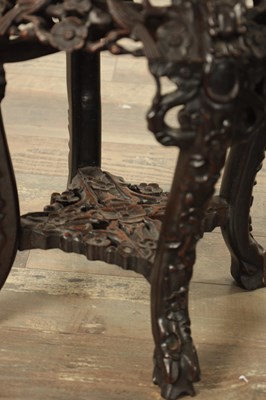 Lot 121 - A PAIR OF 19TH CENTURY CHINESE HARDWOOD JARDINIERE STANDS