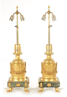 Lot 747 - A FINE PAIR OF EARLY 20TH CENTURY FRENCH ORMOLU AND VERDE ANTICO MARBLE TABLE LAMPS BY GAGNEAU, PARIS.