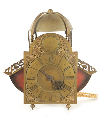 Lot 1067 - A LATE 17TH CENTURY BRASS WINGED LANTERN HOOK AND SPIKE WALL CLOCK