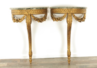 Lot 1307 - A PAIR OF LATE 19TH CENTURY FRENCH GILT CARVED WOOD BOW-FRONTED CONSOLE TABLES