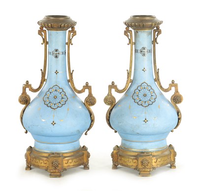 Lot 663 - A PAIR OF FRENCH LATE 19TH CENTURY CERAMIC AND GILT BRASS OIL LAMP BASES