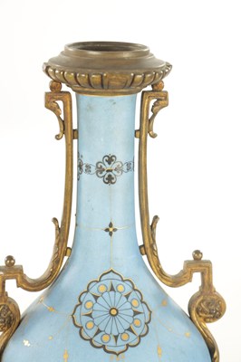 Lot 663 - A PAIR OF FRENCH LATE 19TH CENTURY CERAMIC AND GILT BRASS OIL LAMP BASES