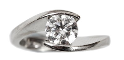 Lot 258 - A SOLITAIRE DIAMOND RING set in an 18ct white...