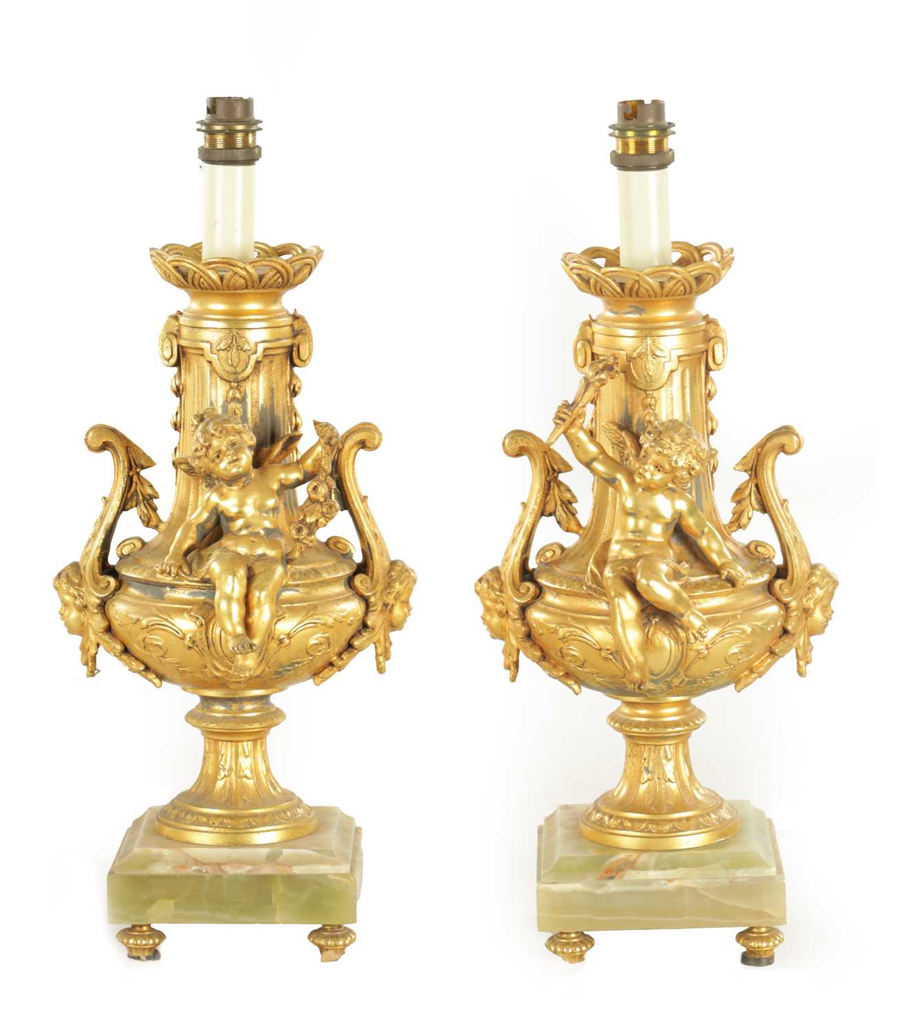 Lot 730 - A PAIR OF EARLY 20TH CENTURY FRENCH GILT METAL AND GREEN ONYX ELECTRIFIED TABLE LAMPS