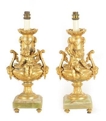 Lot 730 - A PAIR OF EARLY 20TH CENTURY FRENCH GILT METAL AND GREEN ONYX ELECTRIFIED TABLE LAMPS