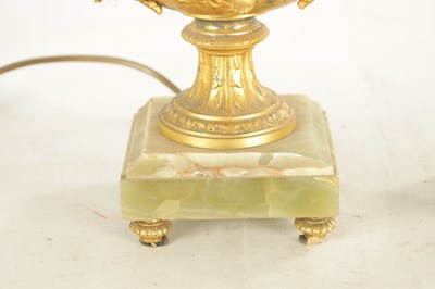 Lot 730 - A PAIR OF EARLY 20TH CENTURY FRENCH GILT METAL AND GREEN ONYX ELECTRIFIED TABLE LAMPS