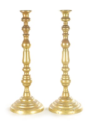 Lot 880 - A LARGE PAIR OF 20TH CENTURY BRASS TABLE LAMPS / CANDLESTICKS