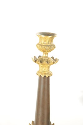 Lot 882 - A GOOD PAIR OF 19TH CENTURY FRENCH EMPIRE BRONZE AND GILT BRONZE CANDLESTICKS