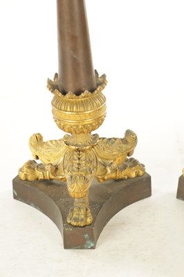 Lot 882 - A GOOD PAIR OF 19TH CENTURY FRENCH EMPIRE BRONZE AND GILT BRONZE CANDLESTICKS