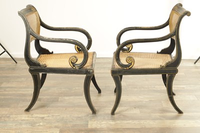 Lot 1306 - A RARE PAIR OF REGENCY PAINTED BERGERE LIBRARY CHAIRS BY JOHN GEE