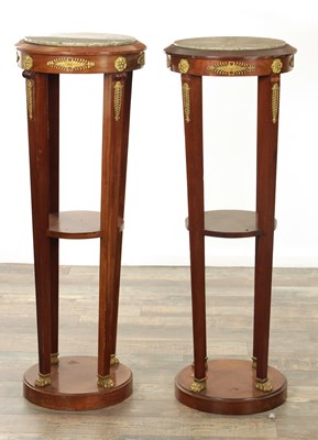 Lot 1293 - A PAIR OF LATE 19TH CENTURY FRENCH ORMOLU MOUNTED MAHOGANY TORCHERES