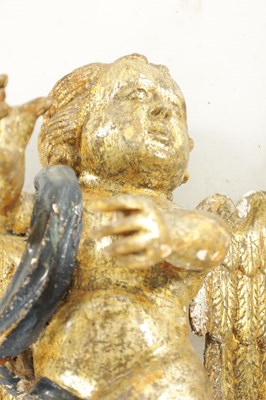 Lot 1182 - A 17TH CENTURY CONTINENTAL GILT-GESSO CARVED CHERUB