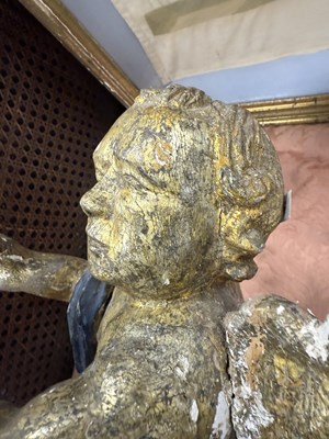 Lot 1182 - A 17TH CENTURY CONTINENTAL GILT-GESSO CARVED CHERUB