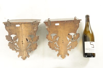 Lot 1178 - A PAIR OF LATE 19TH CENTURY BLACK FOREST HANGING WALL BRACKETS