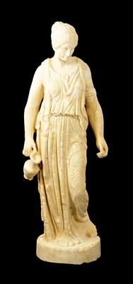 Lot 742 - AN EARLY CARVED WHITE MARBLE STATUE OF A MAIDEN